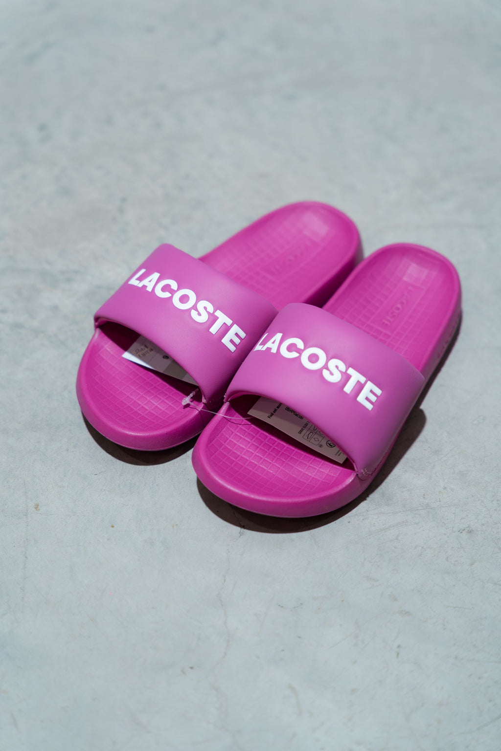 SANDALIAS TIPO SLIDES PLAYERAS FUSIA ORIGINAL LACOSTE