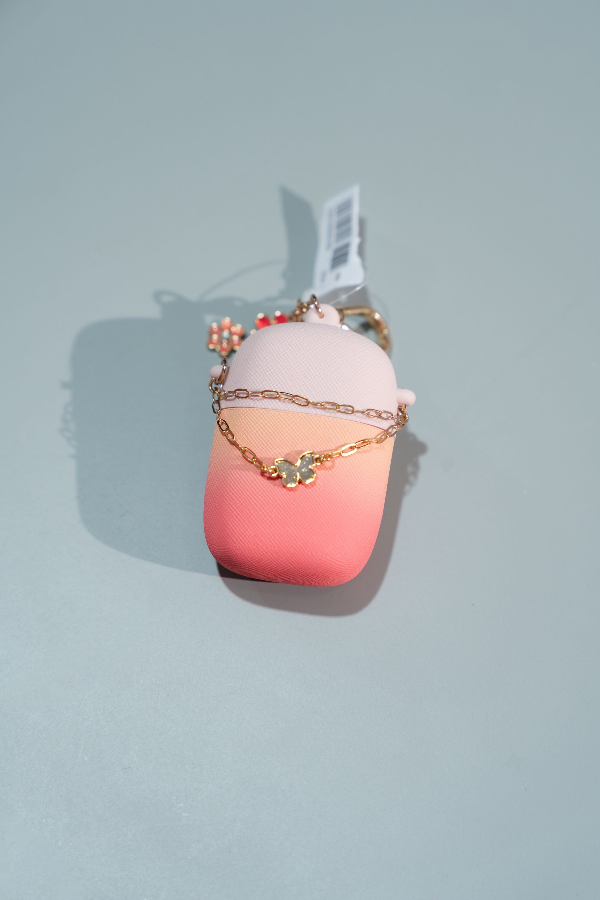 HOLDER PARA GEL DESINFECTANTE CON CADENA Y MARIPOSA